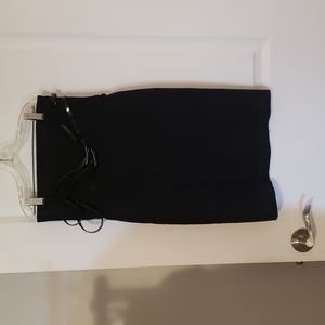 Black pencil skirt with belts . Size small stetcky material